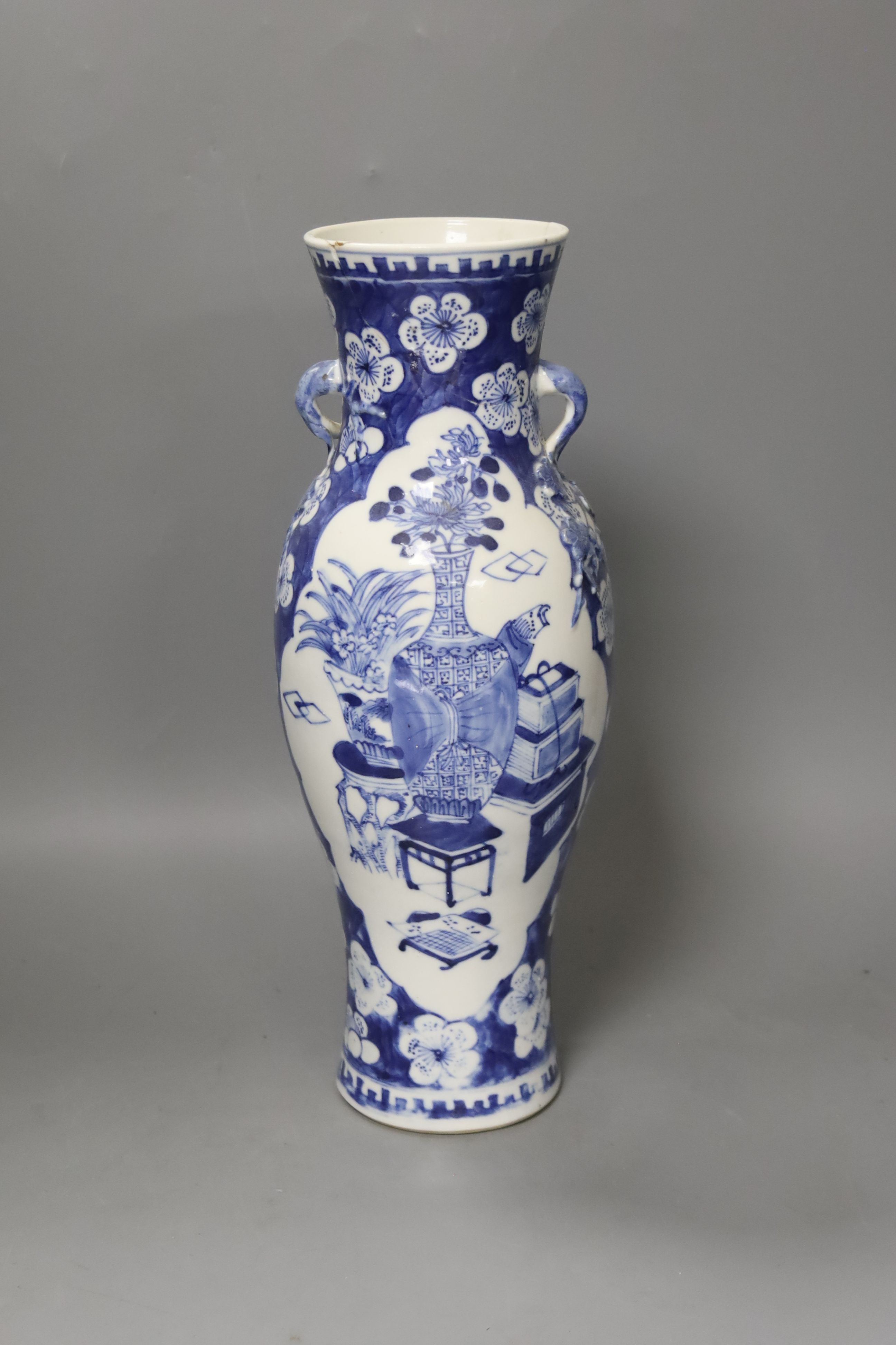 A Chinese Jiaqing export porcelain toilet jug and basin, a small punch bowl, and a blue and white vase (all a.f.) 31cm